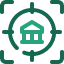 Teal icon of a bank building inside a target crosshair representing mortgage or lending focus